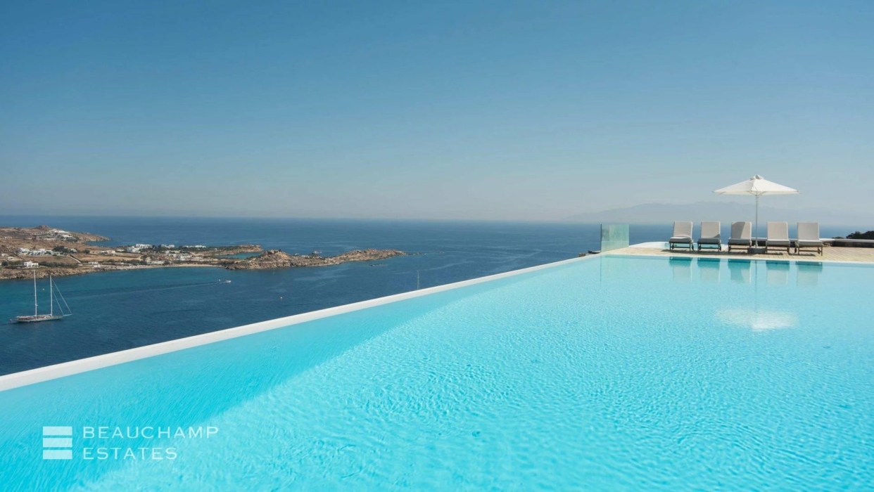 Villa Corina - An exclusive estate overlooking Psarou Beach and boasting stunning Cycladic island vistas. 2024