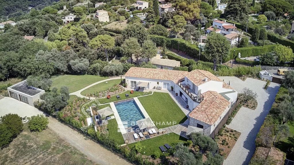 Contemporary 4-bedroom villa nestled in the hills of Saint-Paul-de-Vence with tennis court, swimming pool, and sauna