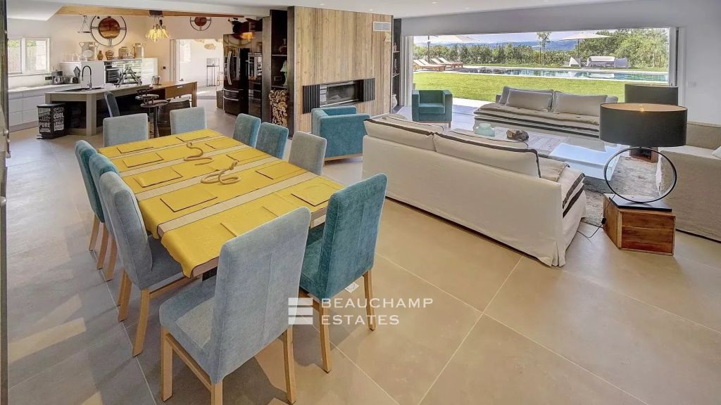Contemporary 4-bedroom villa nestled in the hills of Saint-Paul-de-Vence with tennis court, swimming pool, and sauna