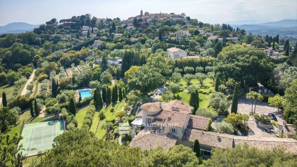 Exceptional domain with 11 bedrooms within walking distance of the village of Mougins, featuring tennis court, pool, and breathtaking sea view