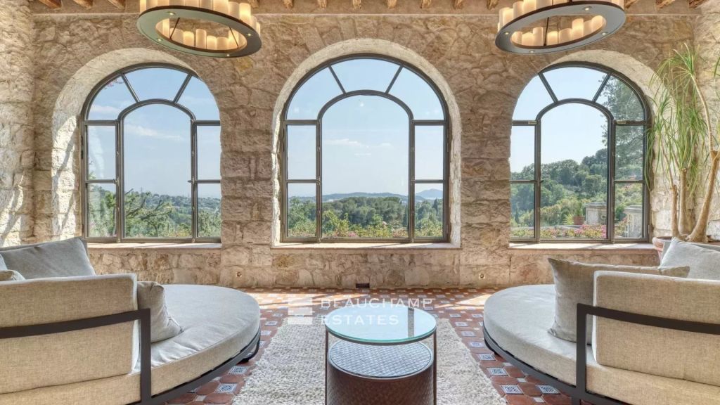 Exceptional domain with 11 bedrooms within walking distance of the village of Mougins, featuring tennis court, pool, and breathtaking sea view