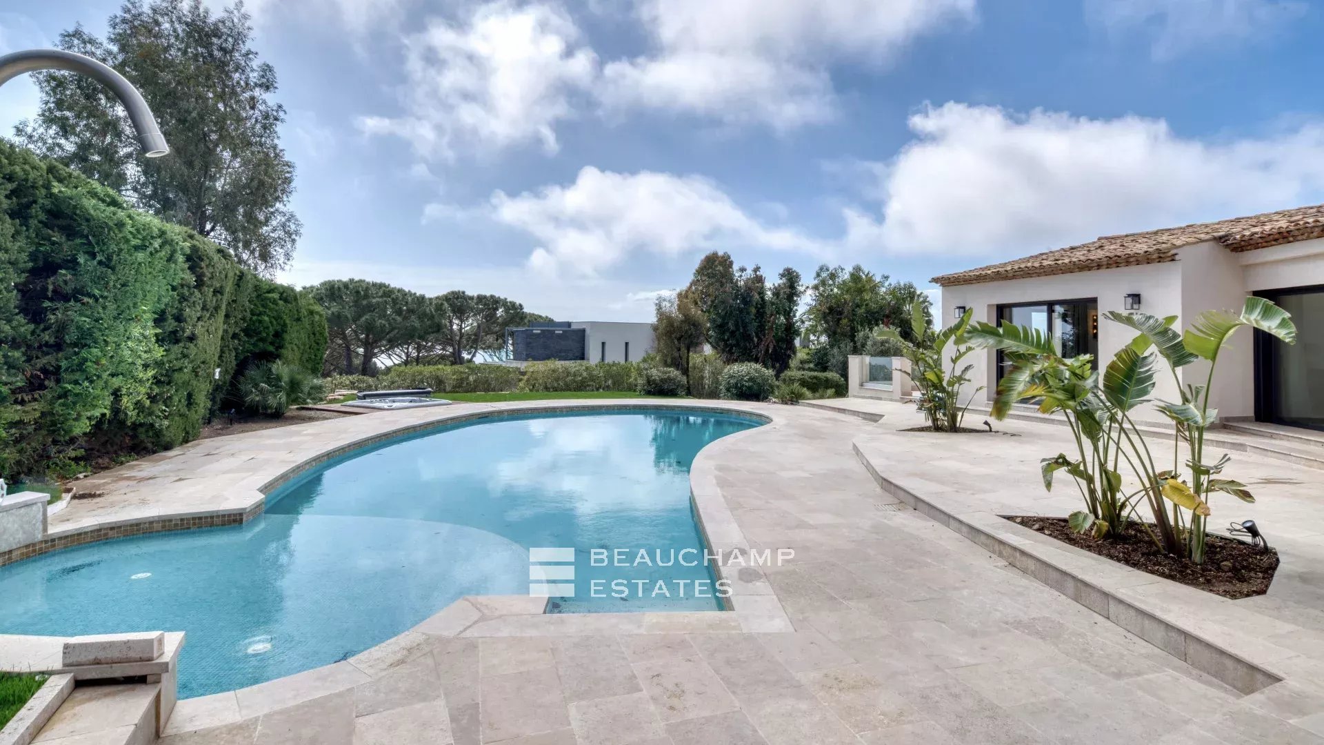 Villa with a tennis court located in the hills of Cannes. Villa with a tennis court located in the hills of Cannes.