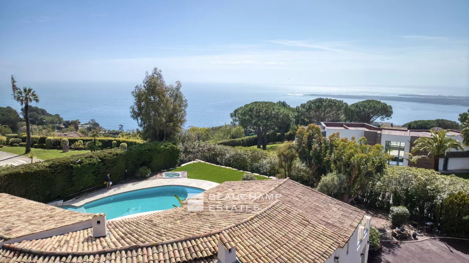 Villa with a tennis court located in the hills of Cannes. Villa with a tennis court located in the hills of Cannes.
