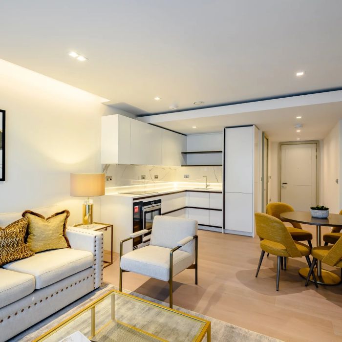 A bright and spacious one-bedroom apartment with a private balcony, nestled in a newly built mansion block