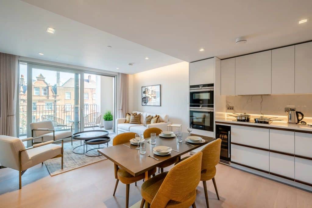 A contemporary two-bedroom, second-floor apartment in a newly built mansion block.