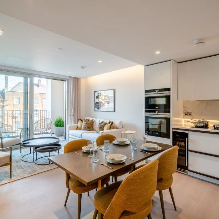 A contemporary two-bedroom, second-floor apartment in a newly built mansion block.