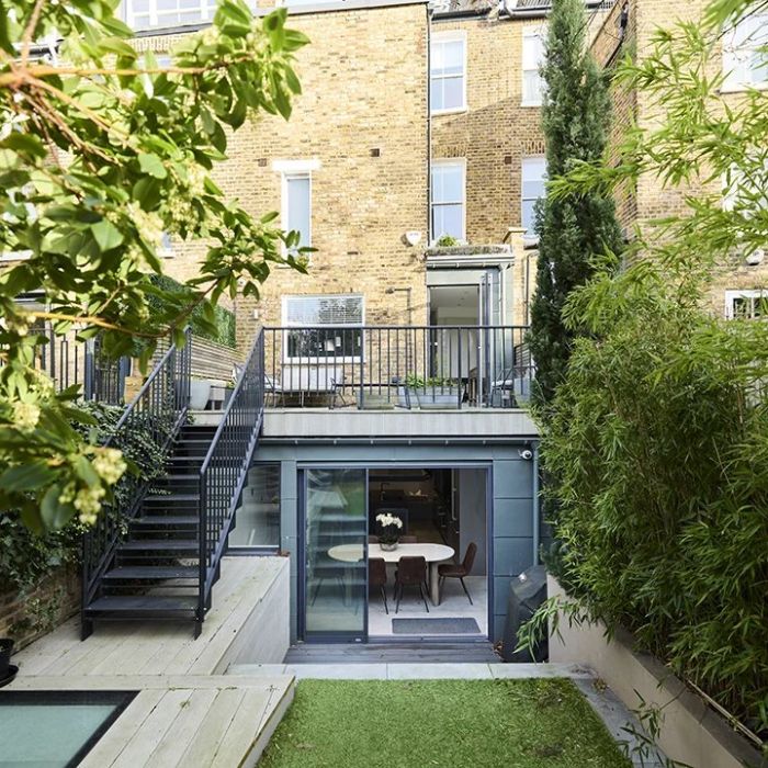 A unique terraced house set over six floors with a garden in a desirable area.