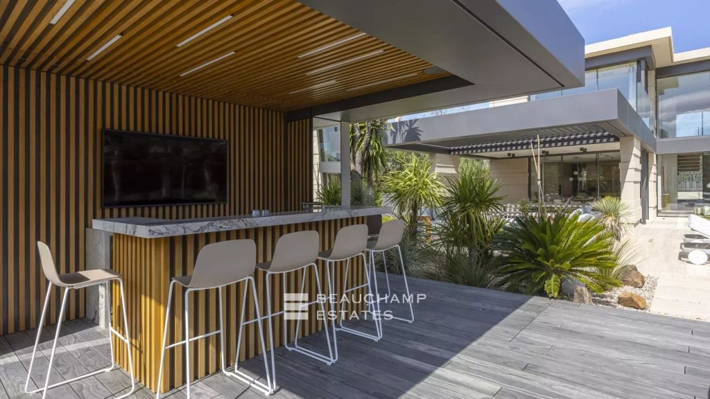 New architect designed villa in the heart of a private estate in Saint-Tropez.