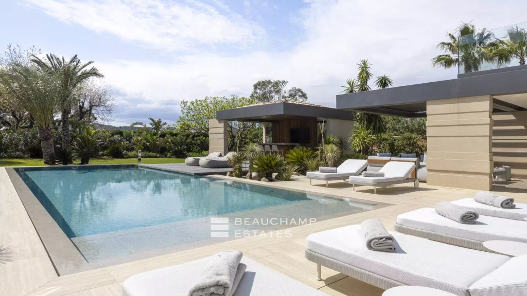 New architect designed villa in the heart of a private estate in Saint-Tropez.