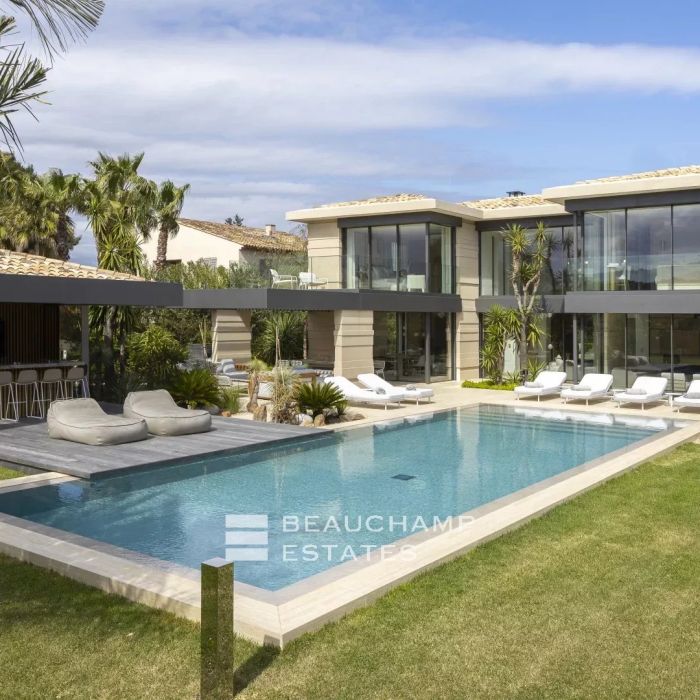 New architect designed villa in the heart of a private estate in Saint-Tropez.