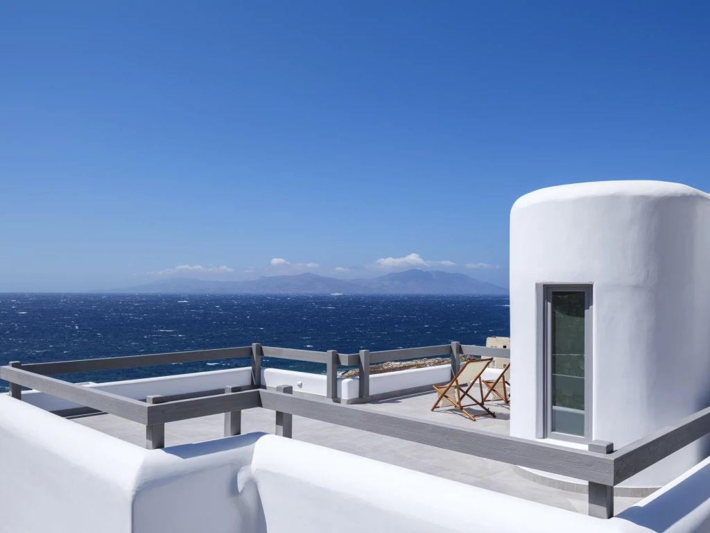 Villa Amare IV | An idyllic escape with panoramic sea vistas and direct access to a private beach.