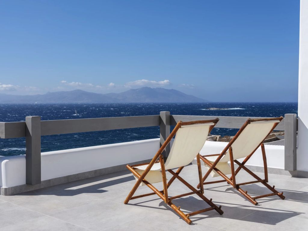 Villa Amare IV | An idyllic escape with panoramic sea vistas and direct access to a private beach.