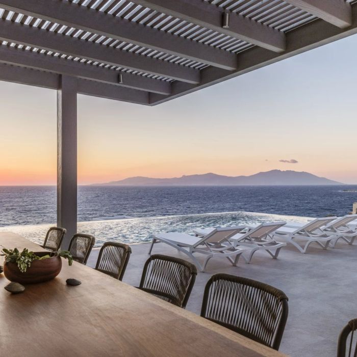 Villa Amare IV | An idyllic escape with panoramic sea vistas and direct access to a private beach.